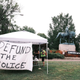 A banner that reads “Defund The Police” is seen during the “Reclaim the Park” gathering at Emancipation Park on August 12, 2020 in Charlottesville, Virginia.